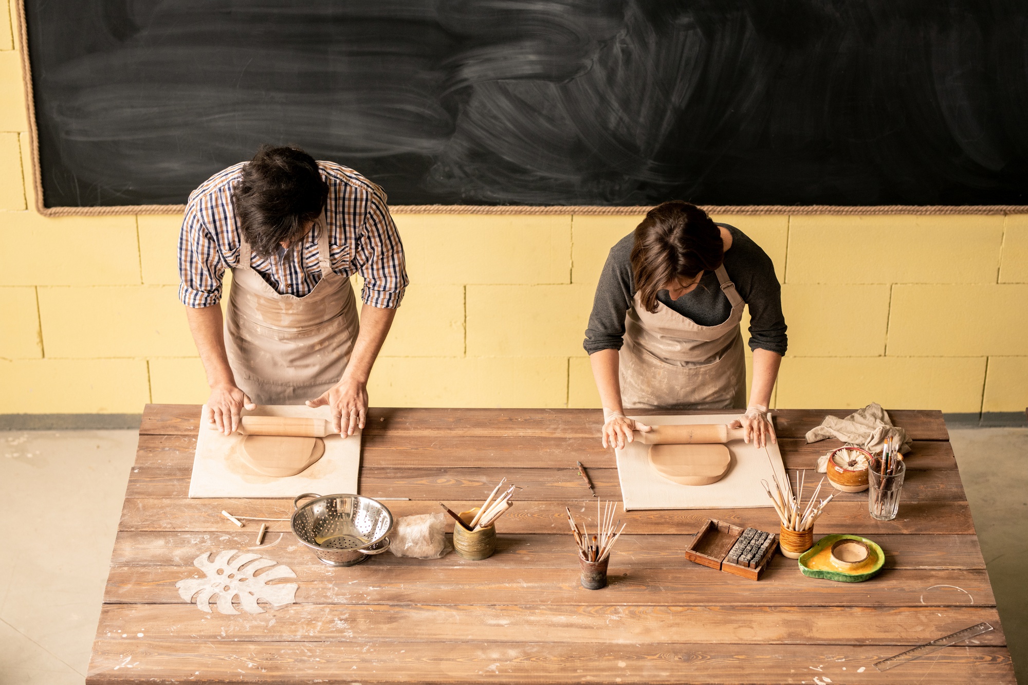 Small hands-on cooking class with students around table