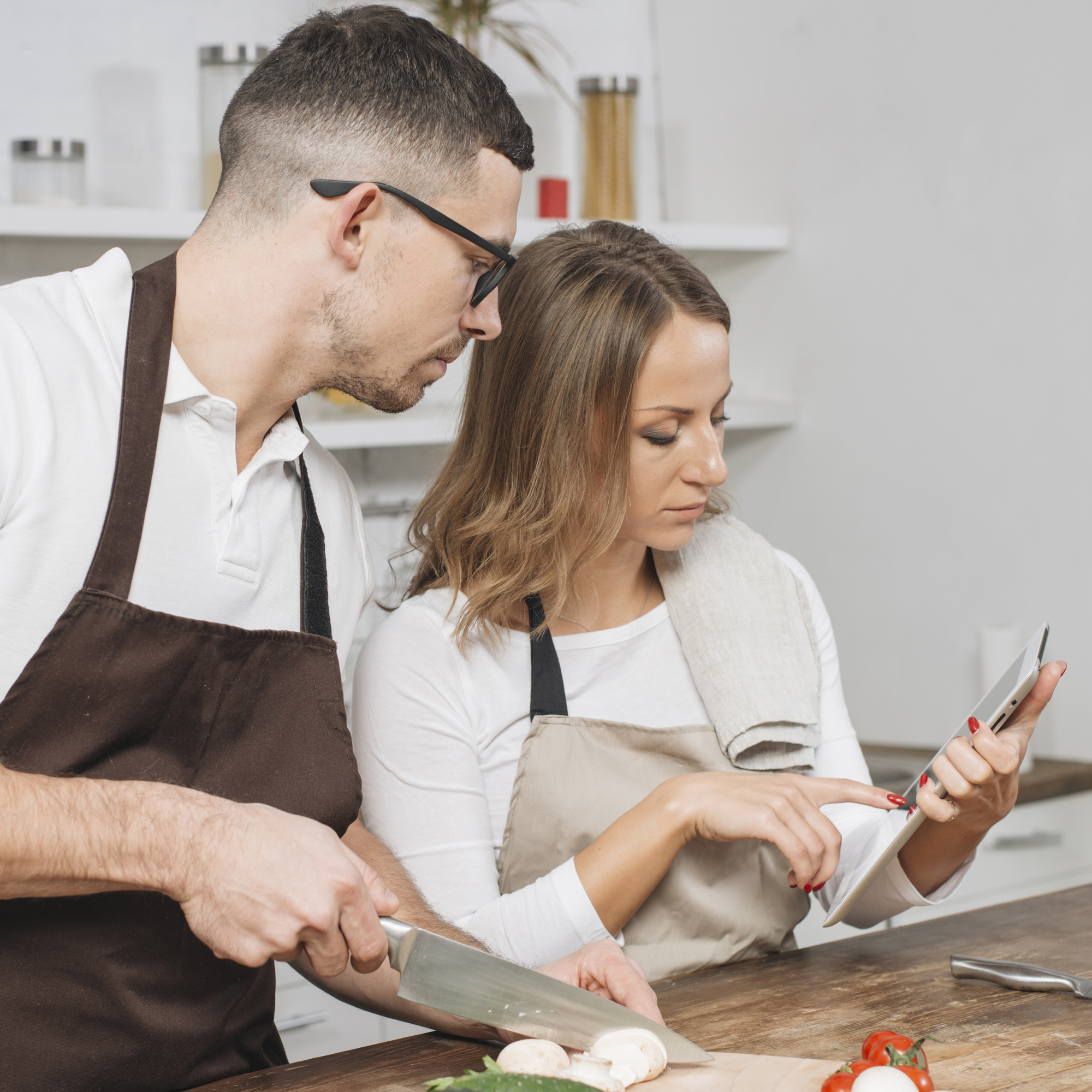 Instructor guiding small cooking team